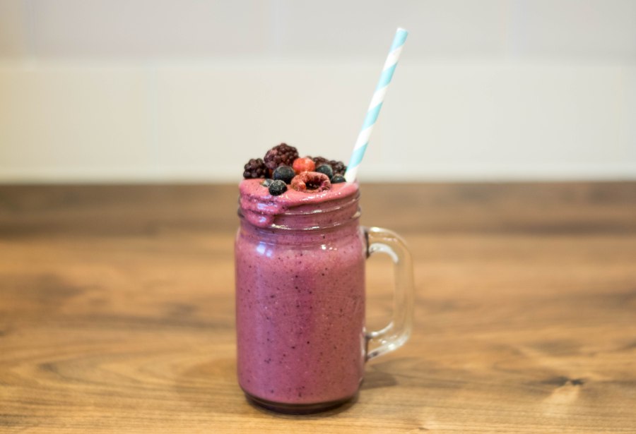 Smoothie in a glass with straw